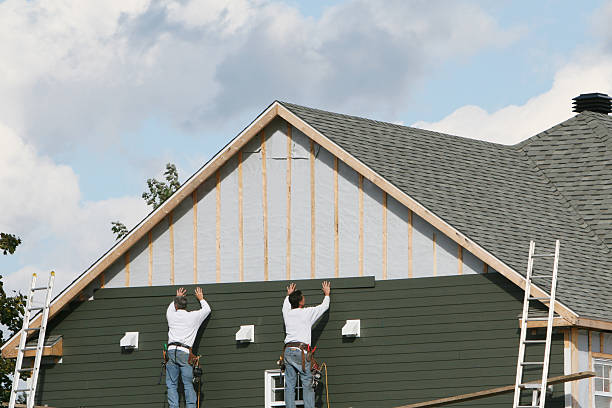 Professional Vinyl Siding technician working in Natick, MA